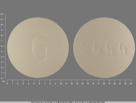 Yellow, round tablet, G 2444