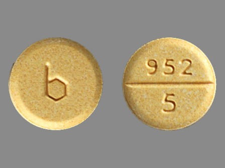 952 5 b yellow round tablet