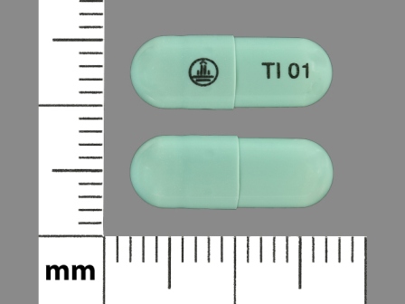 green capsule logo TI 01
