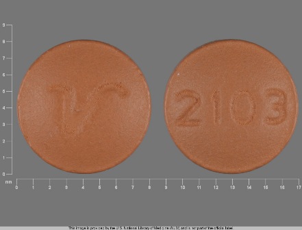 2103 V Brown Round Tablet
