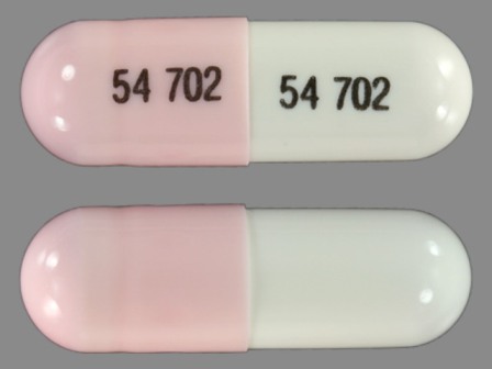 pink, white capsule 54 702