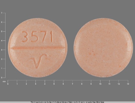 round, orange tablet, 3571 V
