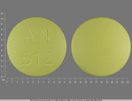 AN 512 round yellow tablet