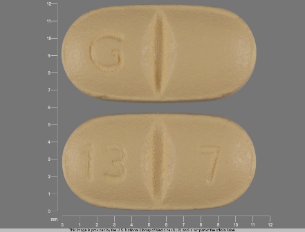oval tan pill G 13 7